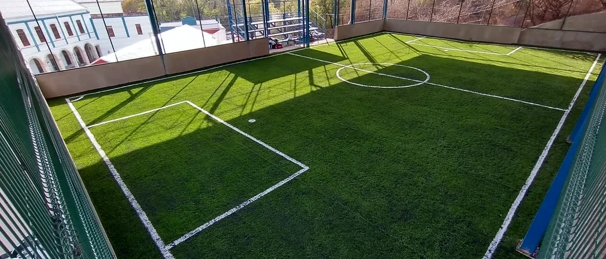 Cancha de fútbol 7 con pasto sintético en Lassalle, Guanajuato, Guanajuato: líneas de juego insertadas en el mismo pasto